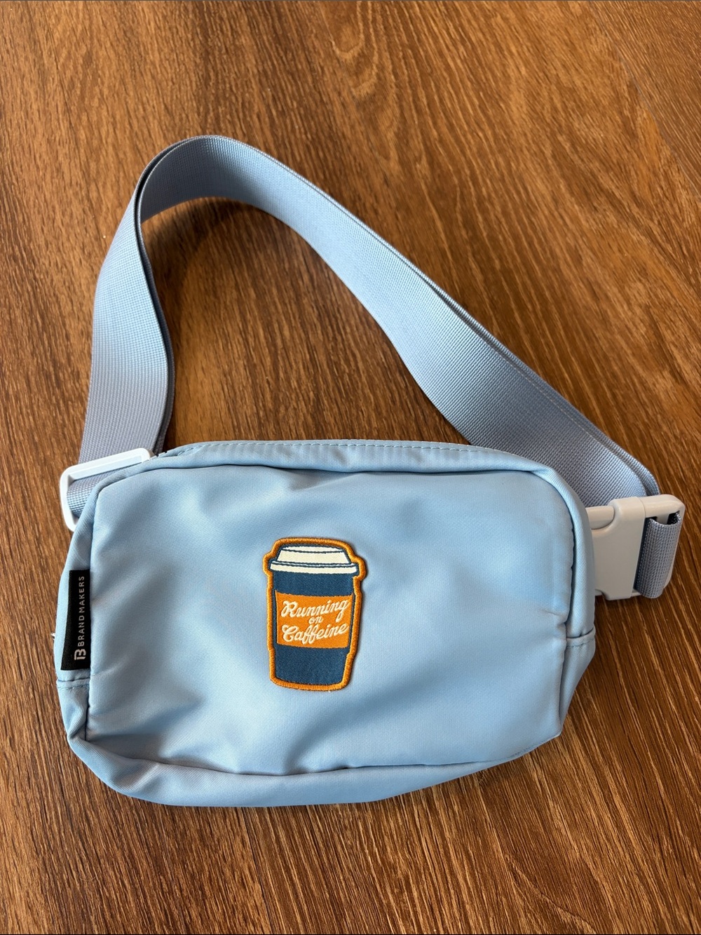 Light Blue Crossbody Belt Bag with Coffee Patch